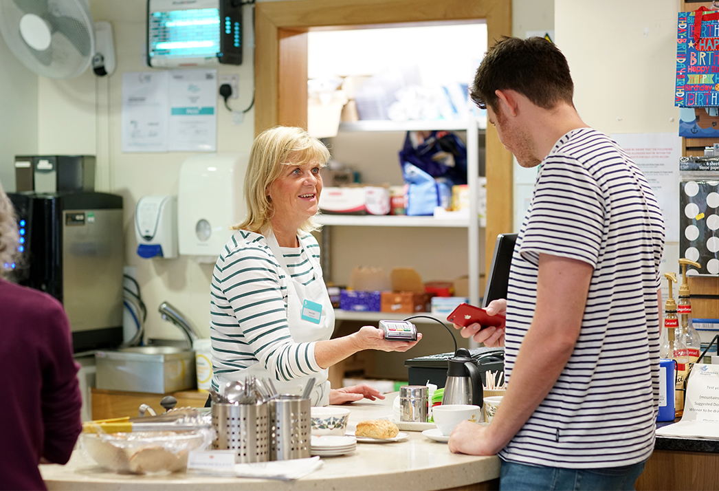A volunteer at the Hospice coffee shop